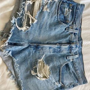 High waisted Levi's distressed jean shorts